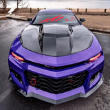 Purple Camaro with red DRLs.