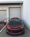 Red Camaro with green halos and DRLs.