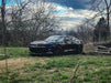 Black Camaro with blue DRLs.