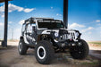 Three quarters view of a Jeep Wrangler JK with LED Off-Road Side Mirrors installed.