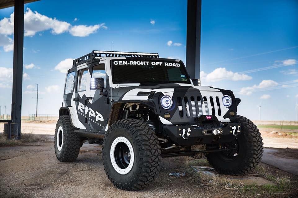 Three quarters view of a Jeep Wrangler JK with LED Off-Road Side Mirrors installed.