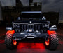 Front end of a Jeep with Upper Windshield Brackets and Light Combo installed.