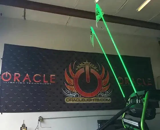 Two Off-Road 6ft ColorSHIFT LED Whips installed with green LEDs