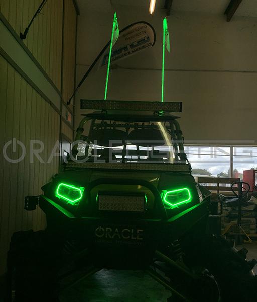 Front view of a Polaris with two Off-Road 4ft ColorSHIFT LED Whips installed.