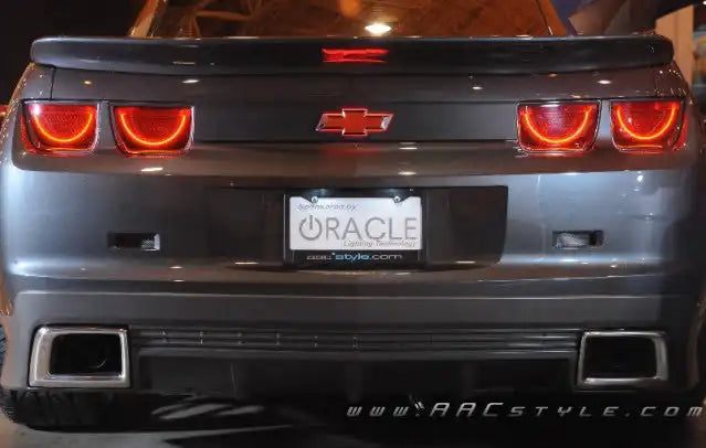 Rear end of a Chevrolet Camaro with Illuminated LED Rear Bowtie Emblem installed.