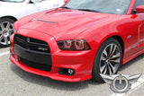 Three quarters view of a Dodge Charger with red LED headlight halo rings installed.