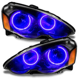 Acura RSX headlights with purple LED halo rings.