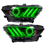 Ford Mustang headlights with green halos and DRLs.