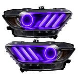 Ford Mustang headlights with purple halos and DRLs.