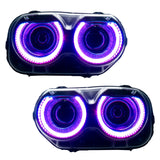 Dodge Challenger headlights with purple LED halo rings.