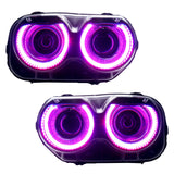 Dodge Challenger headlights with pink LED halo rings.