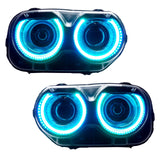 Dodge Challenger headlights with cyan LED halo rings.