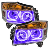 Nissan Titan headlights with purple LED halo rings.