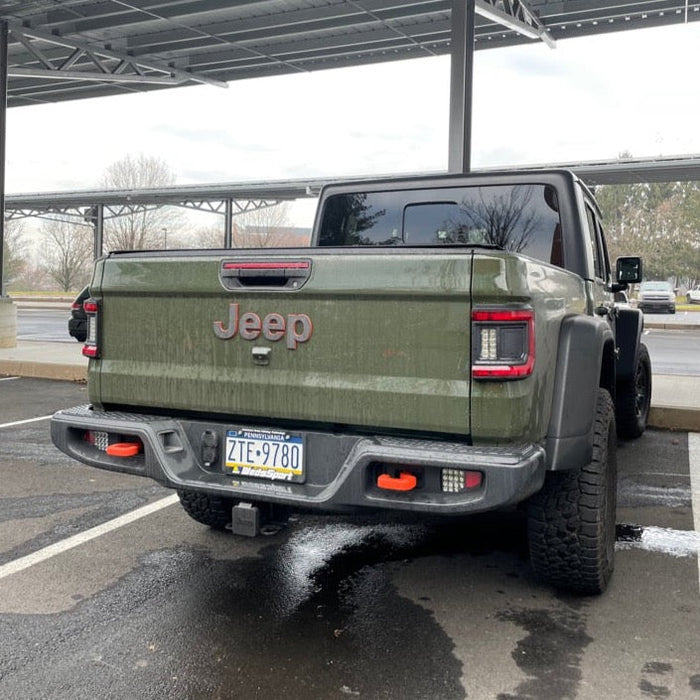 Rear view of a Jeep Gladiator with Rear Bumper LED Reverse Lights installed.