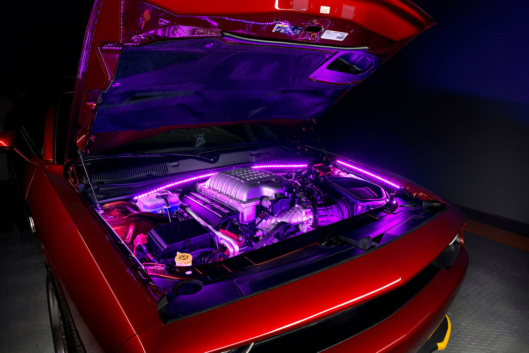 Red Challenger with pink engine bay lighting.