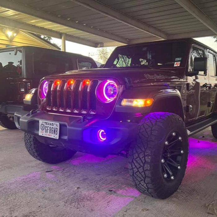 Three quarters view of a Jeep Wrangler JL, with ColorSHIFT Oculus Headlights installed.