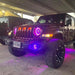 Three quarters view of a Jeep Wrangler JL, with ColorSHIFT Oculus Headlights installed.