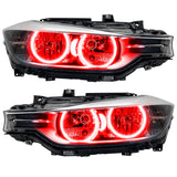 BMW 320 headlights with red LED halo rings.