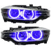 BMW 320 headlights with purple LED halo rings.