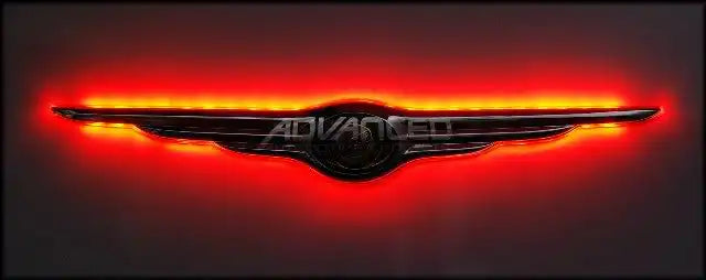 Gen I Chrysler Illuminated LED Rear Wing Emblem with red LEDs.