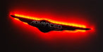 Gen I Chrysler Illuminated LED Rear Wing Emblem with red LEDs.