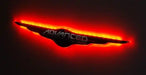Gen I Chrysler Illuminated LED Rear Wing Emblem with red LEDs.