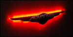 Gen I Chrysler Illuminated LED Rear Wing Emblem with red LEDs.