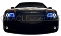Front end of a Chrysler with white LED headlight and fog light halo rings installed.