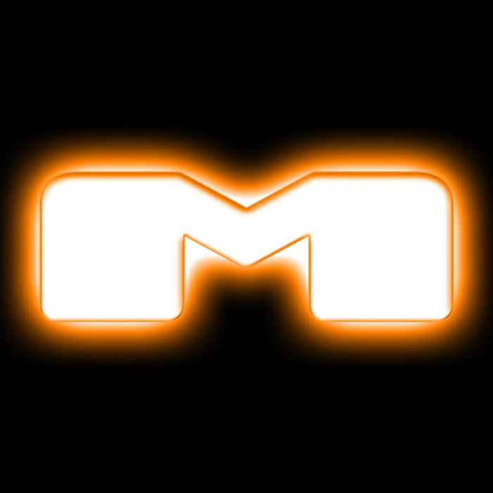 The letter "M" Amber LED Illuminated Letter Badge with matte white finish.