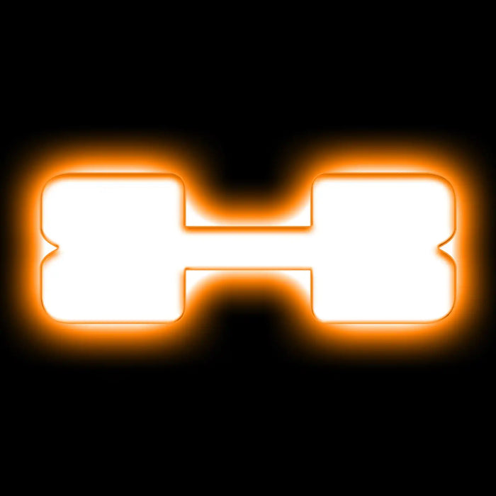 The letter "X" Amber LED Illuminated Letter Badge with matte white finish.