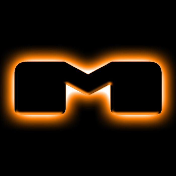 The letter "M" Amber LED Illuminated Letter Badge with matte black finish.