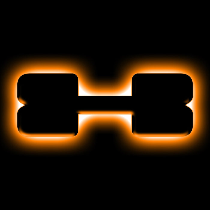 The letter "X" Amber LED Illuminated Letter Badge with matte black finish.