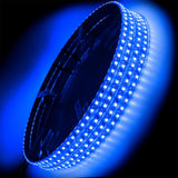 4 wheel rings stacked on top of each other, with blue LEDs.