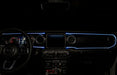 View of a Jeep dashboard from the backseat, with white fiber optic lighting installed.
