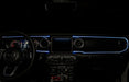 View of a Jeep dashboard from the backseat, with white fiber optic lighting installed.