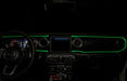 View of a Jeep dashboard from the backseat, with green fiber optic lighting installed.