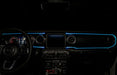 View of a Jeep dashboard from the backseat, with cyan fiber optic lighting installed.