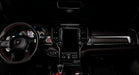 View of a RAM TRX dashboard from the backseat with white LED ambient lighting kit.
