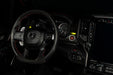 Drivers side seat of a RAM TRX with yellow LED ambient lighting.