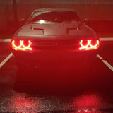 Dodge Challenger with red halo headlights.