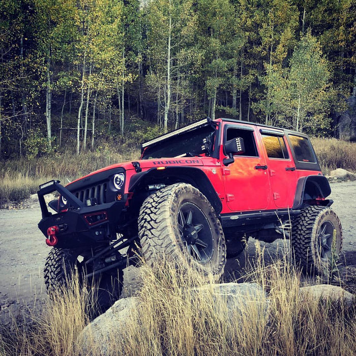 Three quarters view of a Jeep Wrangler JK with LED Off-Road Side Mirrors installed.