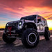 Three quarters view of a Jeep Wrangler JK with LED Off-Road Side Mirrors installed.