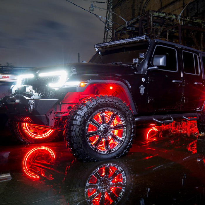Three quarters view of a black Jeep with multiple ORACLE Lighting products installed.