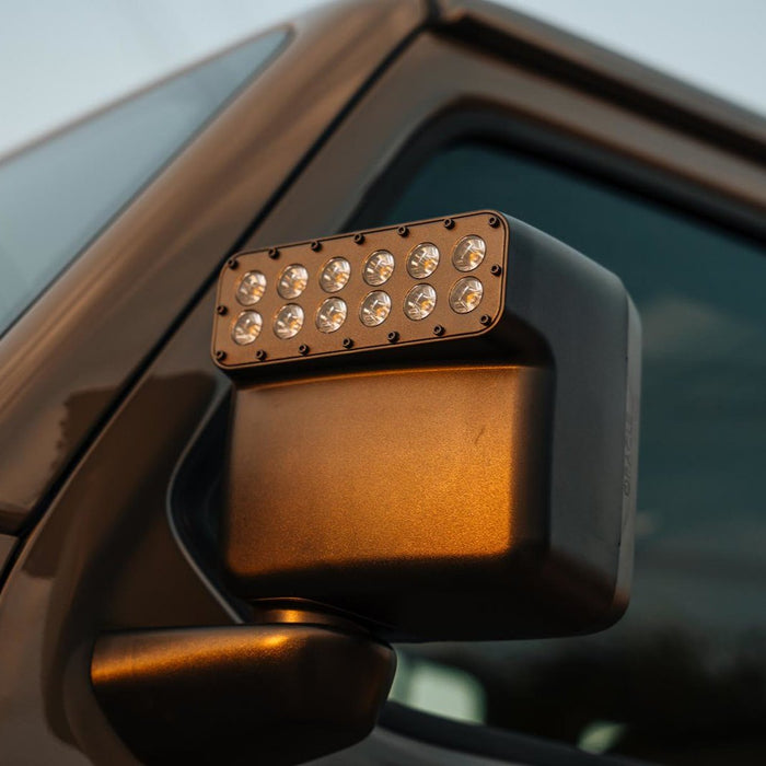 Extreme close-up of a LED Off-Road Side Mirror installed on a Jeep.