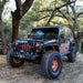 Three quarters view of a Jeep Wrangler JK with LED Off-Road Side Mirrors installed.