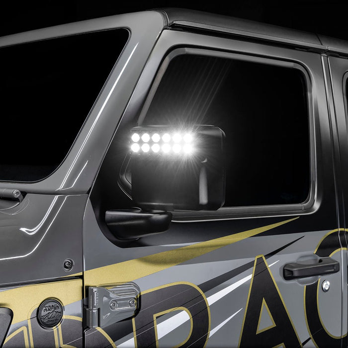 Close-up of a Jeep Wrangler JL equipped with LED Off-Road Side Mirrors turned on.