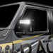 Close-up of a Jeep Wrangler JL equipped with LED Off-Road Side Mirrors turned on.
