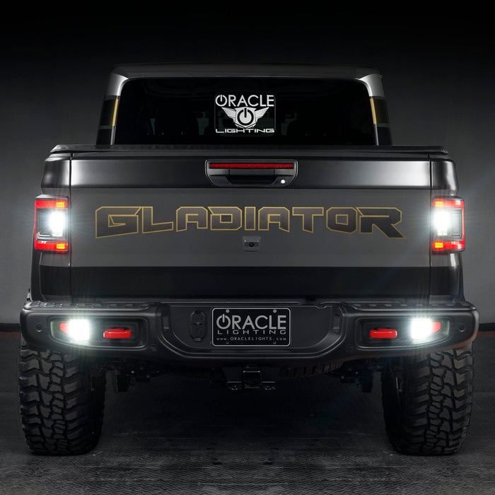 Rear view of a Jeep Gladiator with reverse lights on
