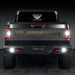 Rear view of a Jeep Gladiator with reverse lights on