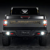 Rear view of a Jeep Gladiator with reverse lights on